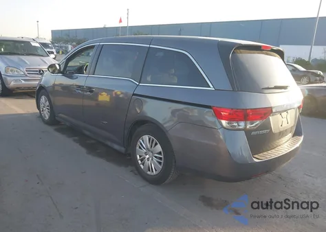 2014 Honda Odyssey Lx z USA, uszkodzony, nr VIN 5FNRL5H21EB123767